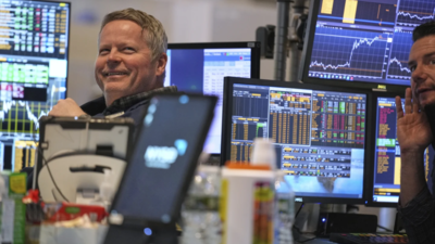 Wall Street dips ahead of big tech earnings and key economic reports