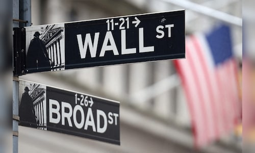 Wall Street rises and pulls close to its record