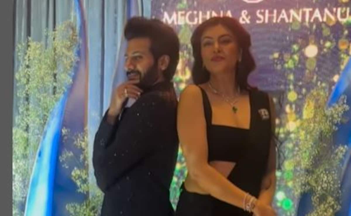 Sushmita Sen And Karan Veer Mehra Twin In Black, Pose For Paps At A Wedding event
