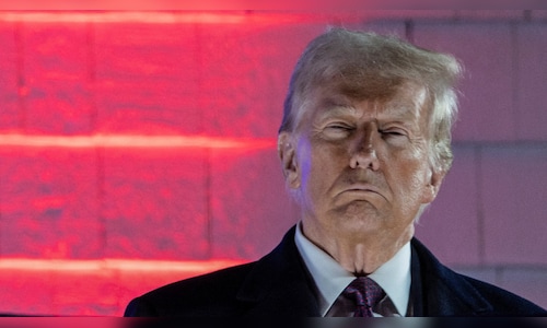 President Donald Trump signs an executive order calling for the elimination of the US Education Department