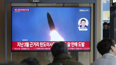 North Korea says leader Kim supervised missile tests simulating nuclear strikes against rivals