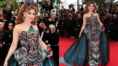 Pass or fail? Urvashi Rautela’s bold look with parrot clutch at Cannes 2025 |