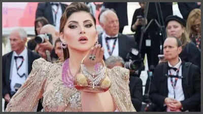 After her parrot clutch, Urvashi Rautela makes heads turn with her bikini gold and diamond bag worth Rs 5.29 lakh at Cannes – See photos |