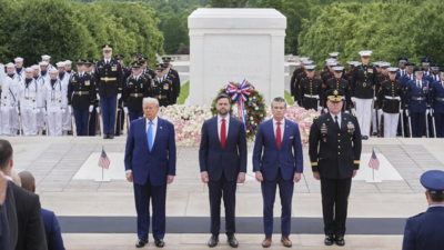 Trump pays tribute to fallen troops at Memorial Day ceremony, calls Biden ‘scum’ in earlier post