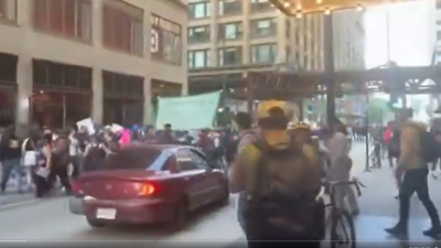 Anti-ICE protest: Car rams into crowd, 66-year old woman injured-Watch video
