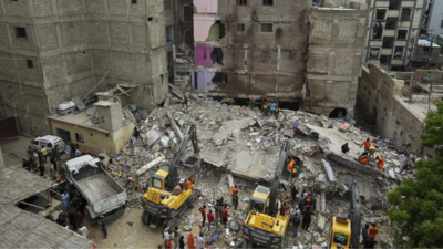 Pakistan building collapse: 16 dead, several feared trapped; authorities say it’s residents’ fault