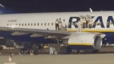 Panic at Spain Airport: Ryanair passengers leap from wing after fire alert; 18 injured in chaos at Palma airport