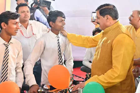 MP CM promises electric scooties, full medical education expenses for meritorious students, ET Education