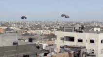Watch: Chaos as Gazans rush for airdropped aid; shots fired to control crowd