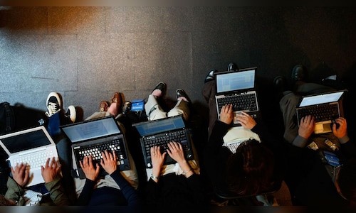 US applications for jobless benefits inch up for the first time in 7 weeks, but layoffs remain low