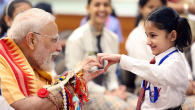Raksha Bandhan with the PM: Modi shares cute moment with children; Brahma Kumaris join celebration – Pics | India News