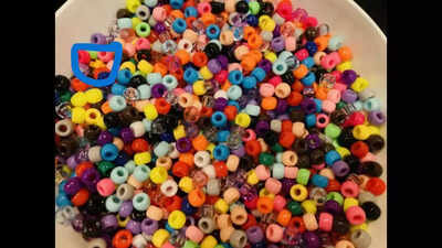 Optical Illusion: Can you find the lego lost in beads? |