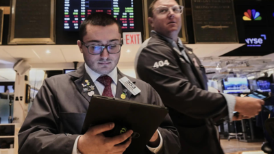 US market today: Stocks mixed as retailers post earnings, investors await Powell speech and Ukraine talks