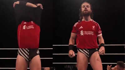 Watch: WWE Wrestler unveils Liverpool jersey in ring – the name on back stuns fans | Football News