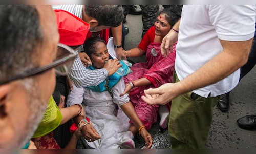 TMC MP Mitali Bag faints during protest march against EC, Rahul Gandhi helps her | Watch