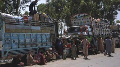 Painted as ‘terrorists & criminals’: Afghan refugees expelled from Pakistan; despite weekend’s deadly earthquake