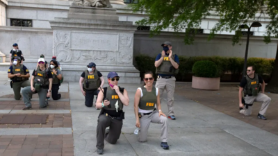 Black lives matter fallout: FBI agents photographed kneeling during 2020 George Floyd protests fired; report says about 20 dismissed