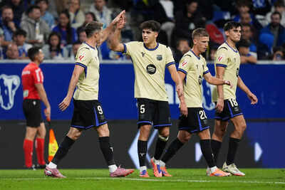 Lewandowski shines as Barcelona overturn Oviedo to stay close to Real Madrid | Football News