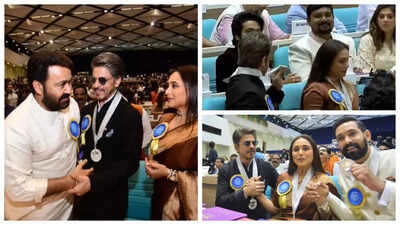 Shah Rukh Khan proudly shows off his National Film Award medal; poses with fellow awardees Mohanlal and Rani Mukerji |