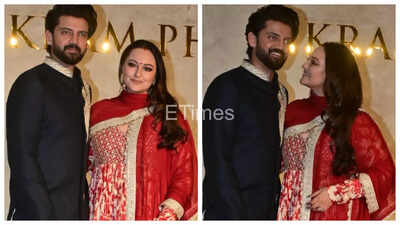 Sonakshi Sinha fuels pregnancy rumors after fans spot her covering her belly while posing with Zaheer Iqbal at Vikram Phadnis’ fashion show | Hindi Movie News