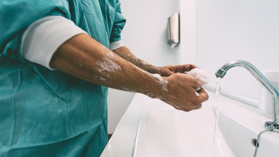 Why do heart surgeons wash their hands for exactly one minute before surgery