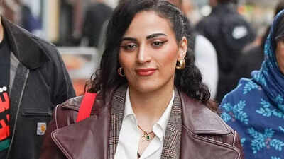 British-Palestinian doctor accused of backing October 7 Hamas attack wears gold necklace with number 7, faces backlash: ‘Racist, anti-semite’