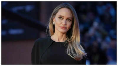 Angelina Jolie shows off back tattoo in backless dress at ‘Couture’ premiere – PICS |