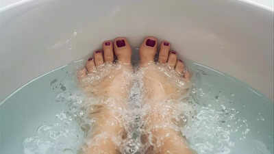 Tired legs? A simple hot water foot soak can ease pain, relax muscles and help you sleep better, studies show |