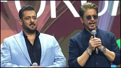 Shah Rukh Khan and Salman Khan return to Mumbai; fans and paparazzi surround the actors at airport |