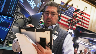 US stocks today: Wall Street holds near record highs as investors await Tesla earnings; Gold slips again