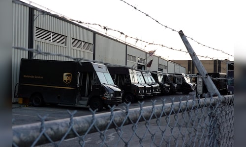 UPS to eliminate 30,000 more jobs as Amazon volume cuts accelerate; shares rise