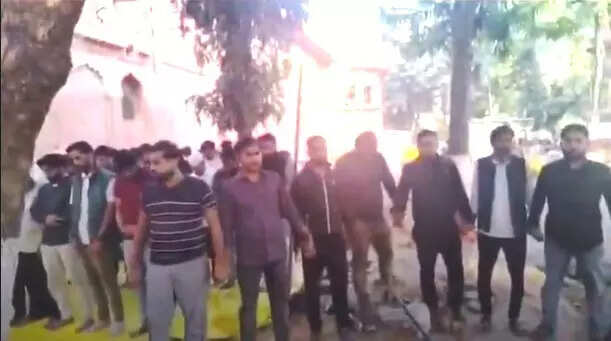 Lucknow University namaz row escalates as students form human chain to shield Muslims offering prayers outside sealed mosque, ETEducation
