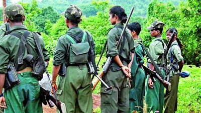 11 Maoists with Rs 63 lakh bounty surrender | India News