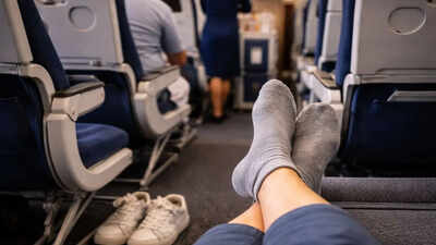 Why you should never go barefoot on a plane and always wear socks |